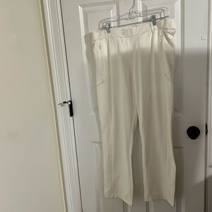 White put on suit pants with extra pockets